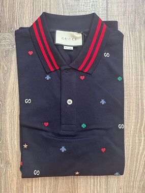 Gucci Navy Polo with Red Stripe Collar and Multicolor Embroidered Motifs
